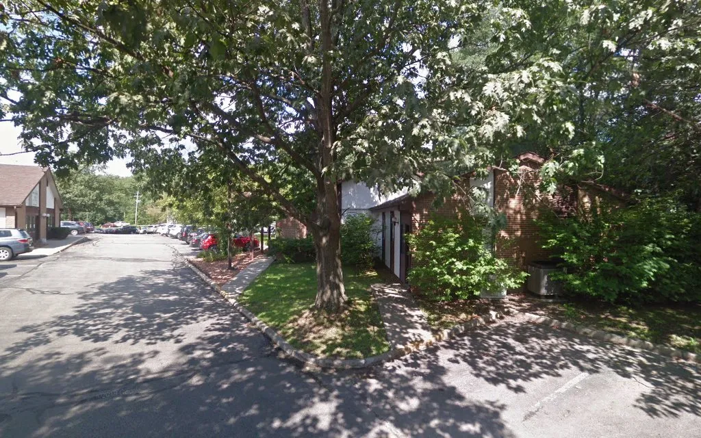 The tree-lined drive at 501 Route 208, Monroe